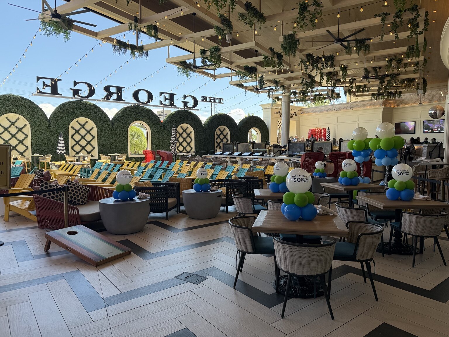 Global Foods company anniversary event decor and branded balloons